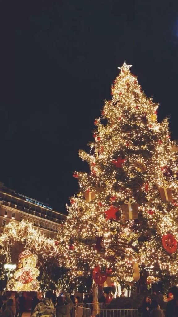 A beautifully decorated Christmas tree with sparkling lights and ornaments. In the holiday spirit merry moments
